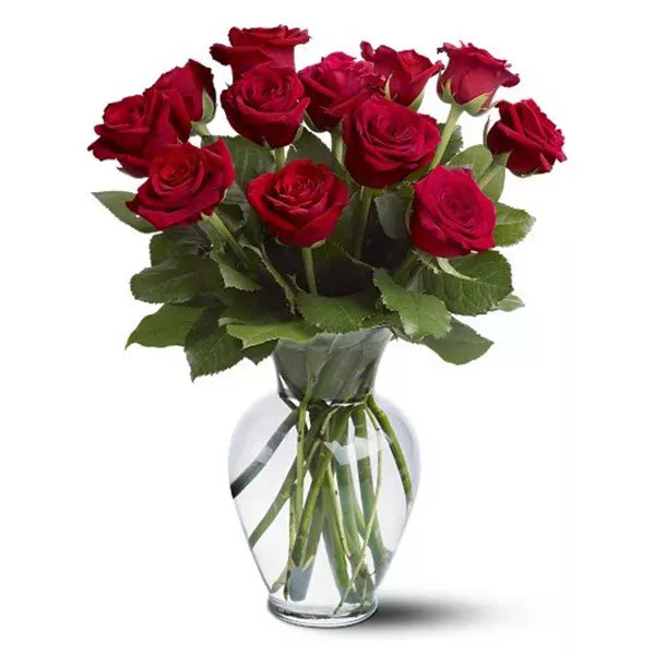 red rose bouquet in a clear glass vase