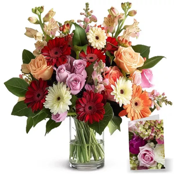 A vibrant bouquet of mixed flowers in a glass vase with a small inset image showing detail.