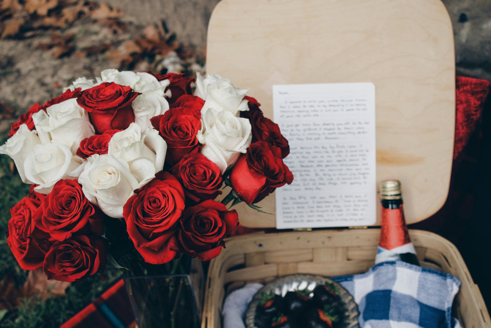 Red and white roses with picnic basket, Seth Reese